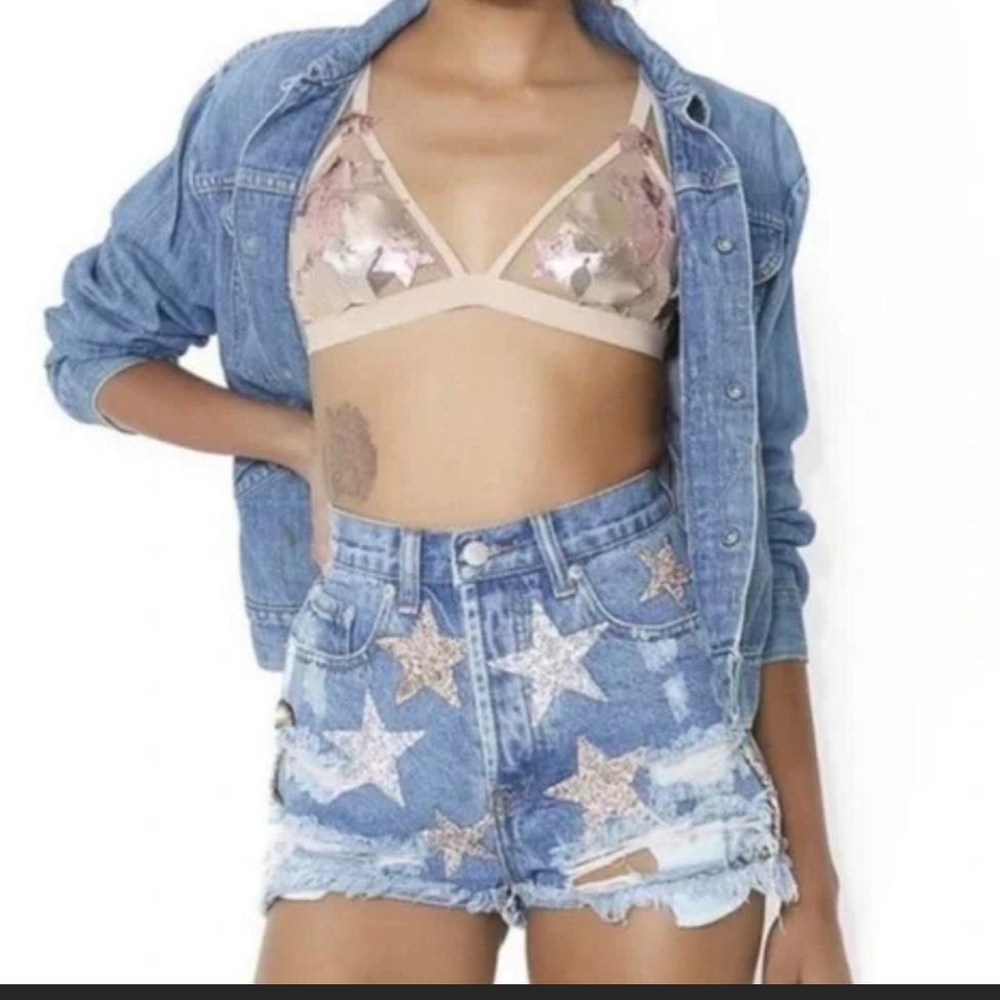 Denim Shorts star embellishments . size small